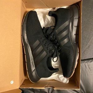 Adidas running shoes.